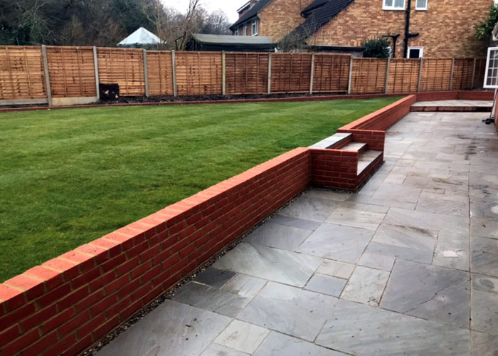 Split level garden construction including
						brickwork, paving and new turf laying in Buckhurst Hill, Essex